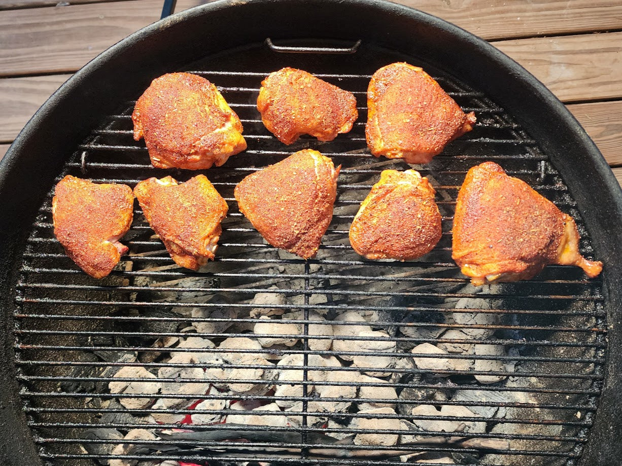 Pasture Raised, Free Range Chicken Thighs Cooking on the Grill