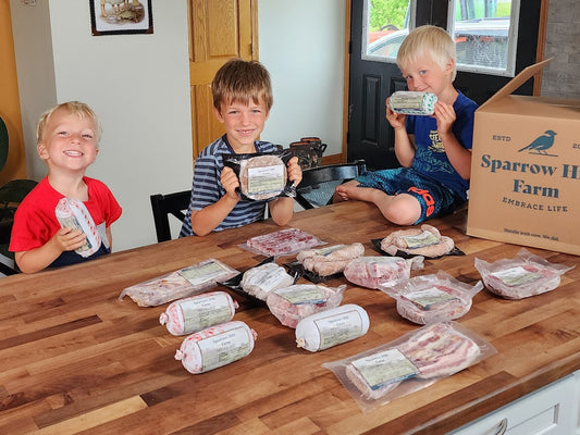 Kids with the Family Essentials Meat Bundle